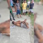 Pelaku pembacokan yang merupakan ODGJ diamankan aparat bersama masyarakat, Rabu (25/03). (Dok. Warga).