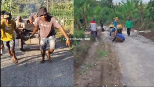Masyarakat bergotong rotong mengaspal jalan, antara Desa Bitingan – Tengger, Kecamatan Sale, Selasa (14/04).