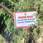 Papan himbauan untuk truk tambang, dipasang oleh pihak Desa Candimulyo, Kecamatan Sedan, Kabupaten Rembang.